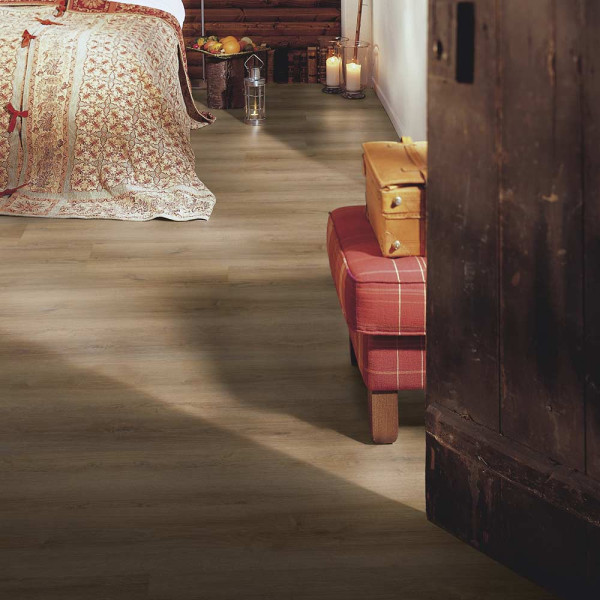 Holzoptik mit hellbraunem Farbton und feinen Maserungen bildet den Klick-Vinylboden Wineo Design Comfort Home ab. Das Material wirkt ästhetisch und natürlich in der Raumgestaltung.
